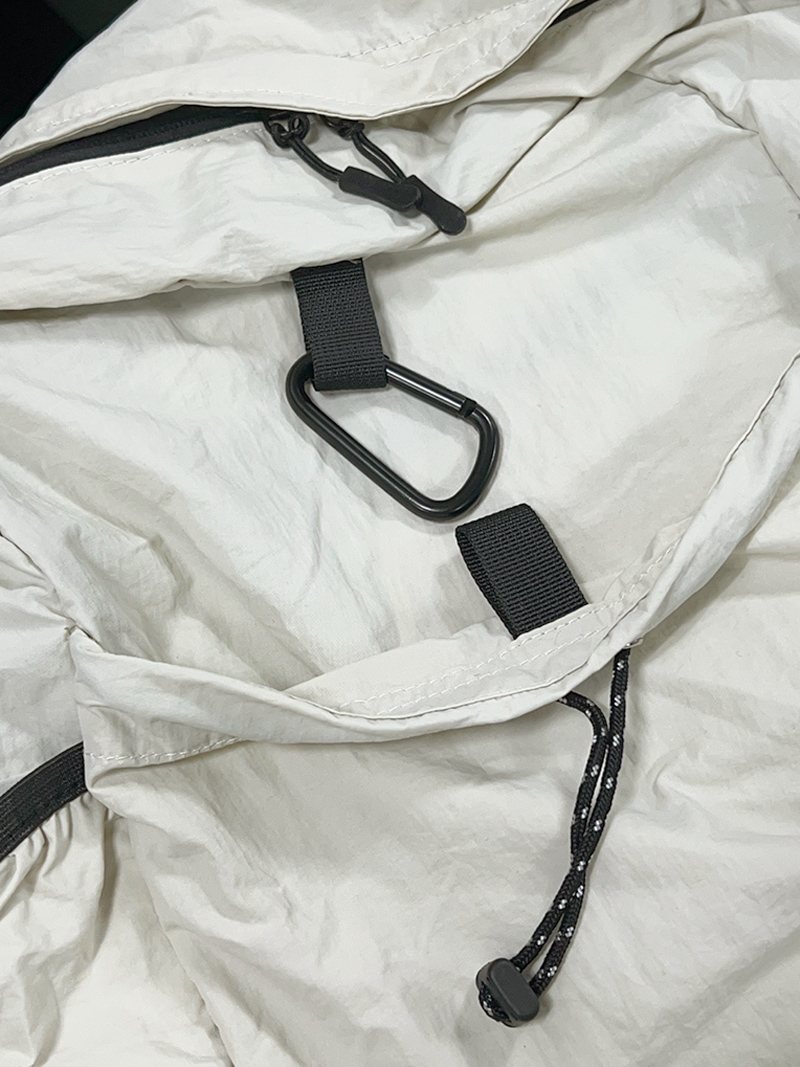 Nylon backpack with waist drawstring pockets