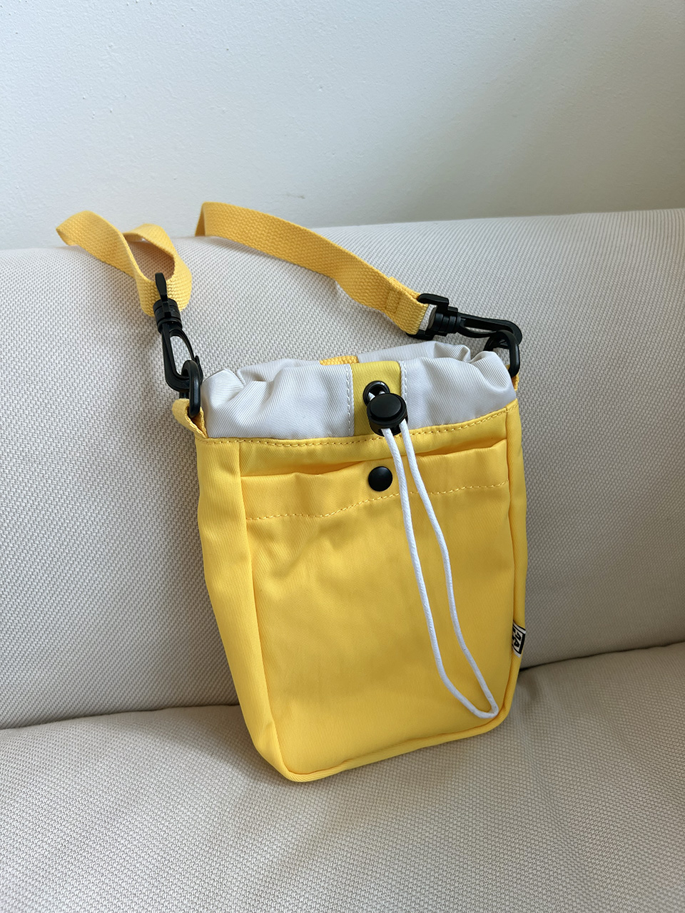 Roasted string mini crossbody bag