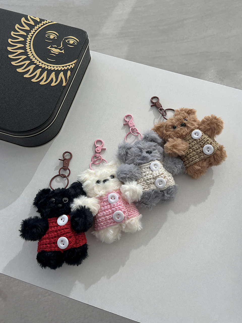 Knitted teddy bear button charm