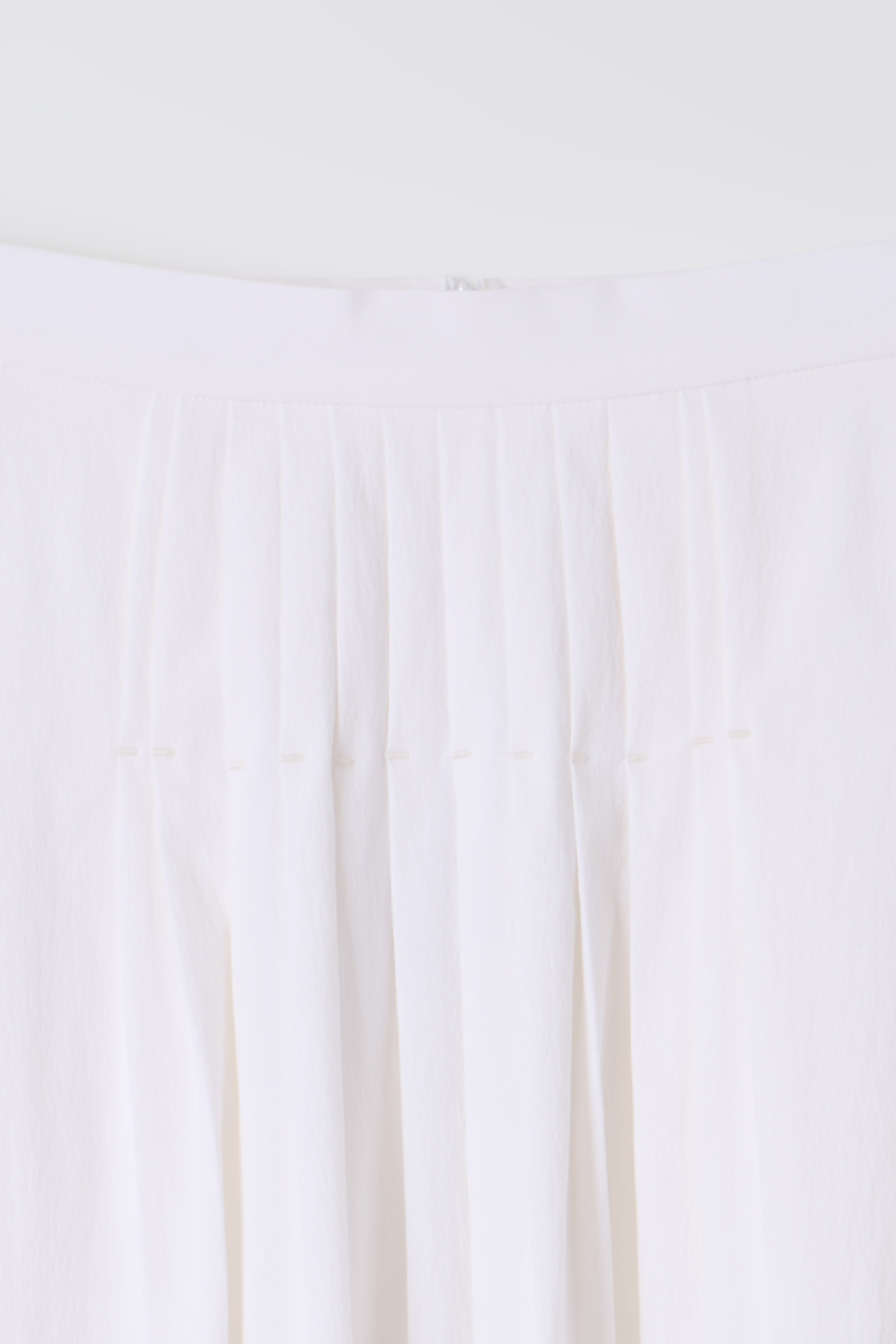 asym pleats skirt (ivory)