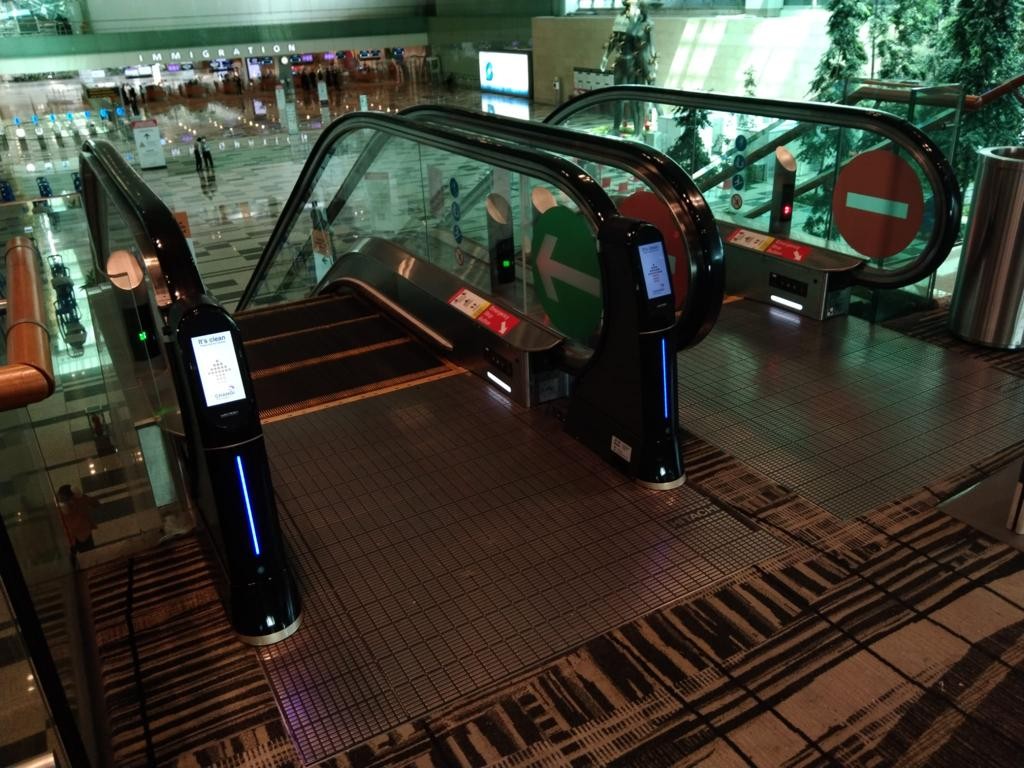 WeClean, an escalator handrail coronavirus sterilization cleaner installed at Singapore Changi Airport Terminal 3,12