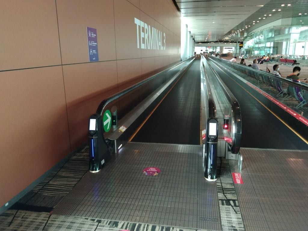 WeClean, an escalator handrail coronavirus sterilization cleaner installed at Singapore Changi Airport Terminal 3, 1