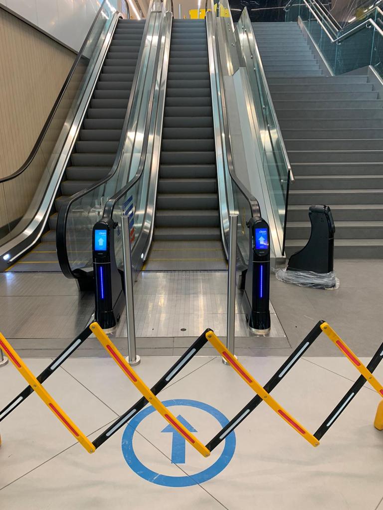 WeClean, an escalator handrail coronavirus sterilization cleaner installed at Kuwait International Airport, 2