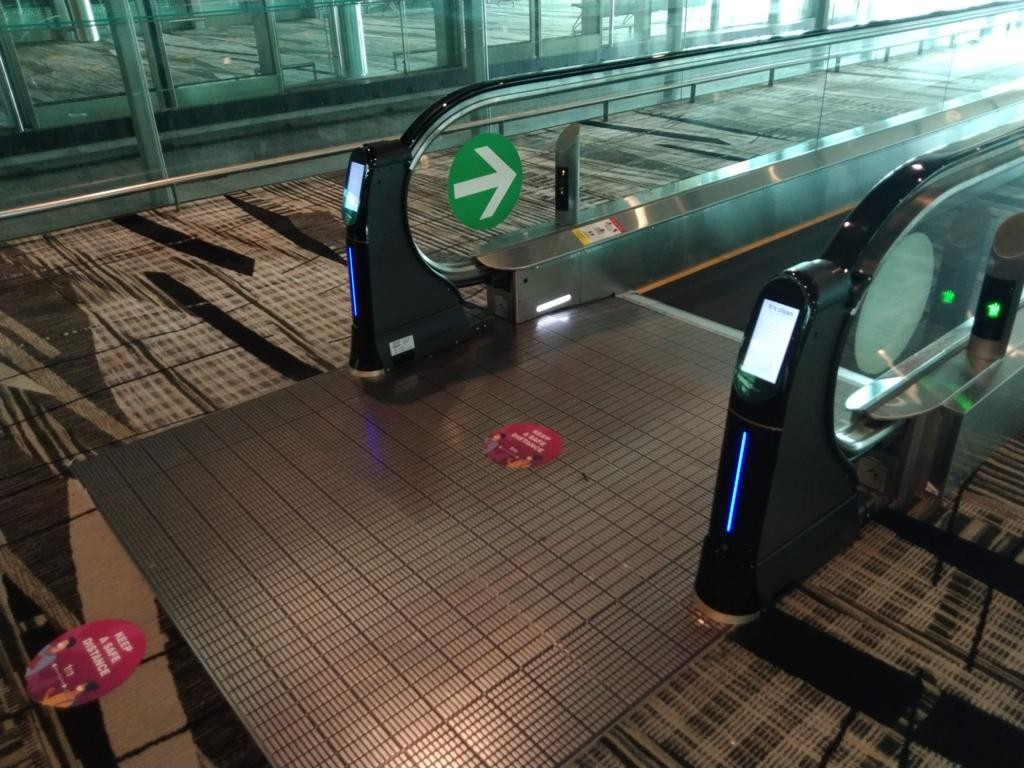 WeClean, an escalator handrail coronavirus sterilization cleaner installed at Singapore Changi Airport Terminal 3, 11