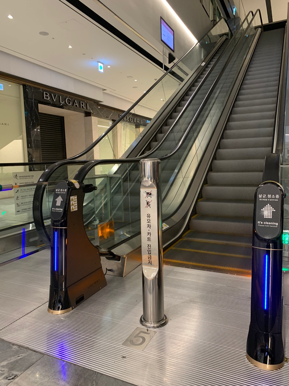 Shinsegae Department Store with WeClean, an escalator handrail sterilization, disinfection cleaner, 2