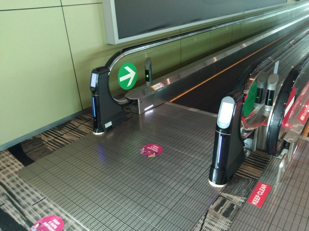 WeClean, an escalator handrail coronavirus sterilization cleaner installed at Singapore Changi Airport Terminal 3, 9