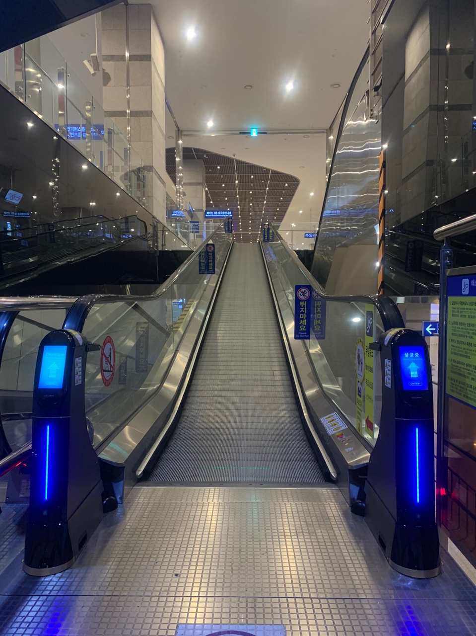 WeClean, an escalator handrail coronavirus sterilization cleaner installed at Busan International Passenger Terminal, 1