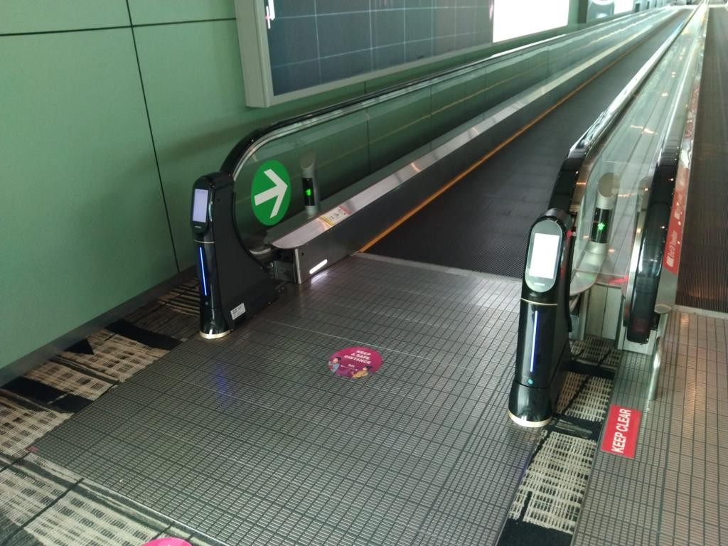 WeClean, an escalator handrail coronavirus sterilization cleaner installed at Singapore Changi Airport Terminal 3, 6