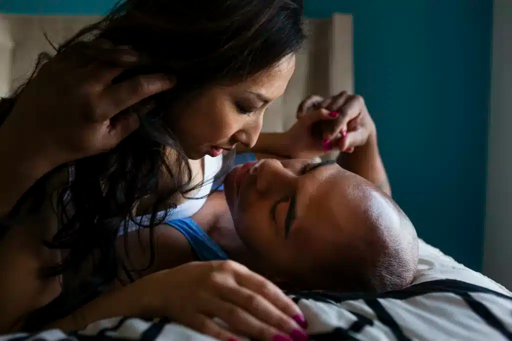 mid adult couple kissing on bed 2025 04 04 14 53 32 utc