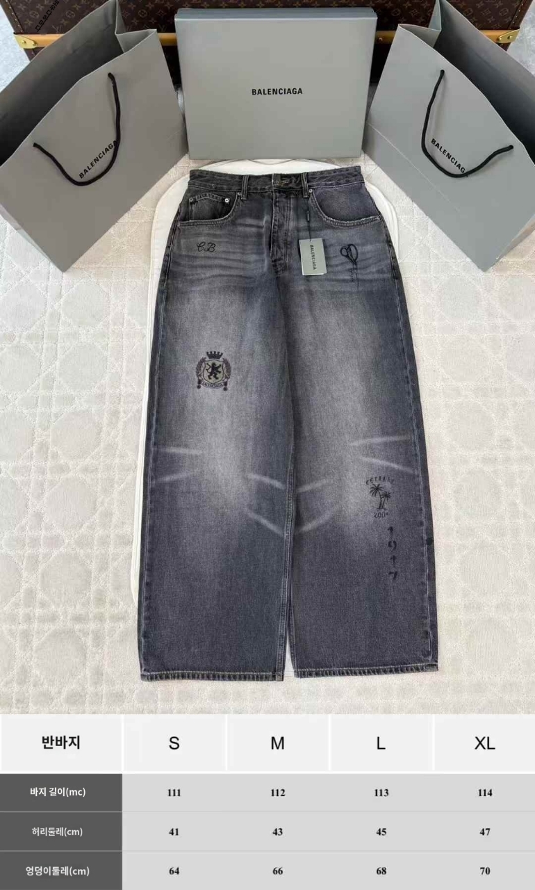 발렌시어거 타투 배기 데님 팬츠