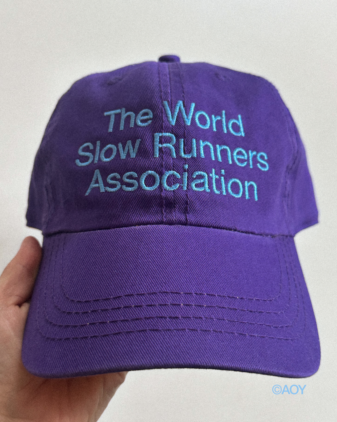 THE WORLD SLOW RUNNERS ASSOCIATION CAP IN GRAPE