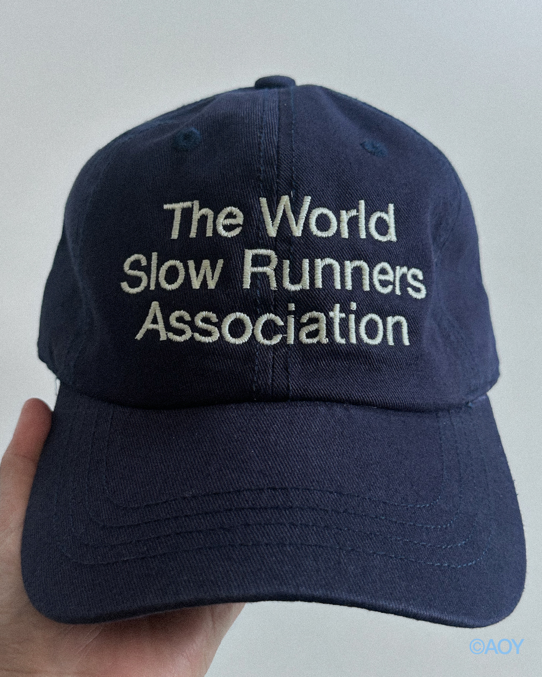THE WORLD SLOW RUNNERS ASSOCIATION CAP IN NAVY