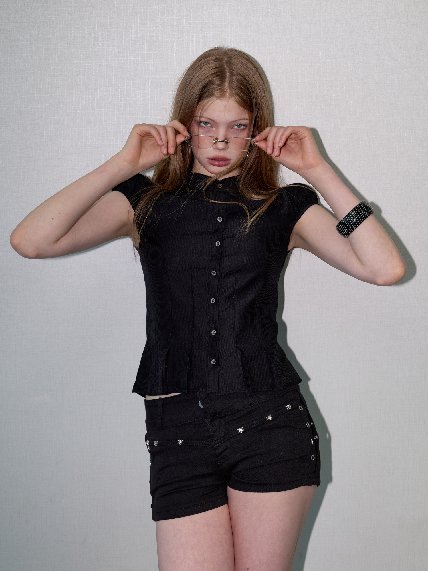 Metal button pleated blouse black