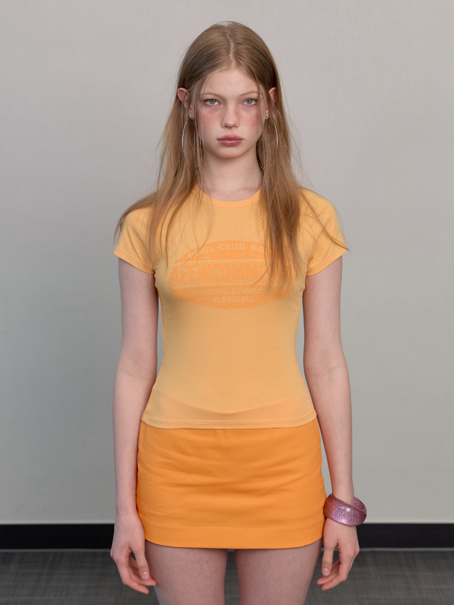 Round crack logo tee orange