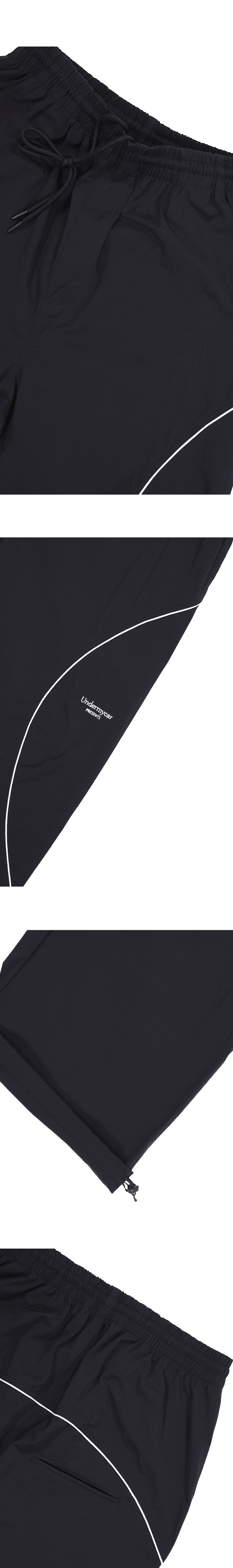 MU.180 Classic Logo Piping Curve Line Track Pants Black