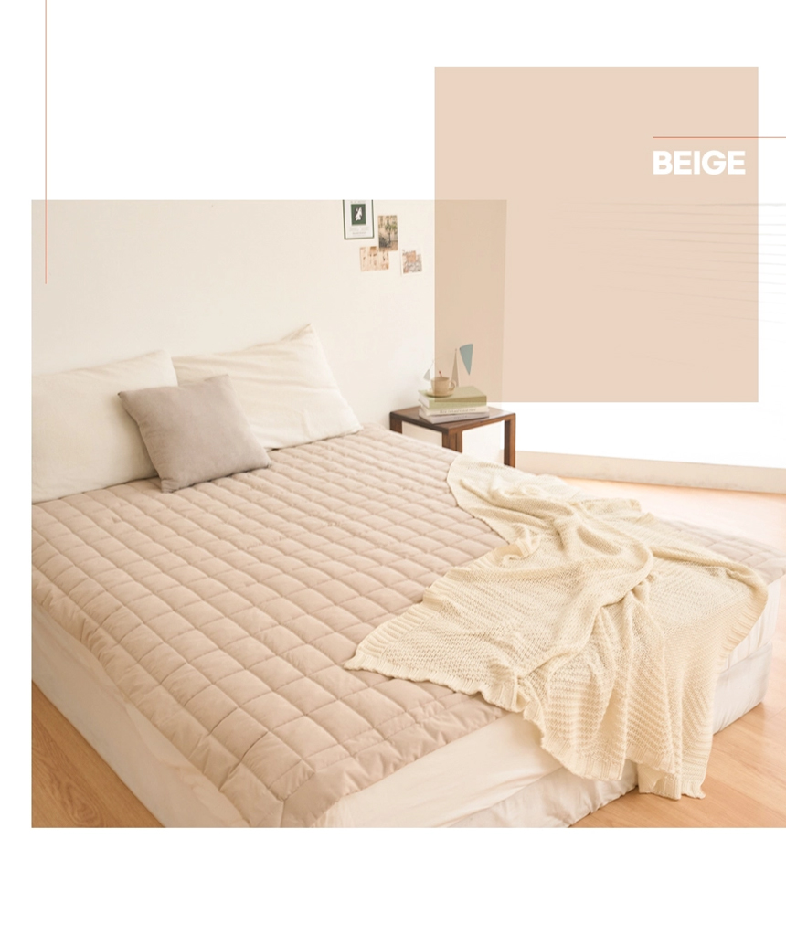 Beige Dr.Friend Sleep Pad displayed in a warm-toned bedroom, emphasizing soft textures and natural comfort