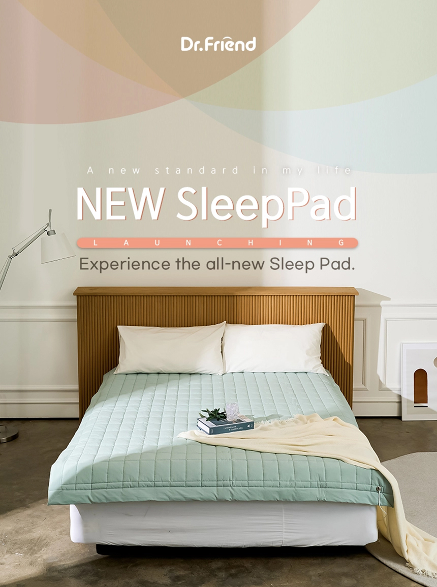 Dr.Friend New Sleep Pad displayed on a bed, featuring a clean bedroom interior and modern sleep care design