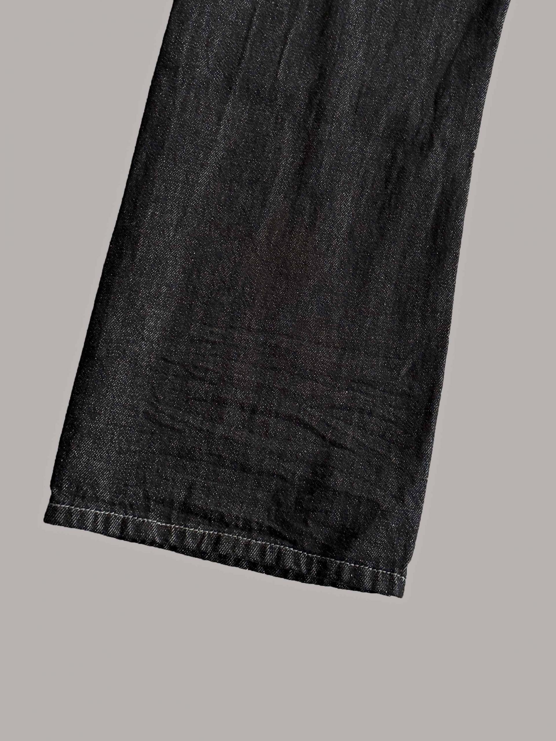 Embossed non-faded denim pants