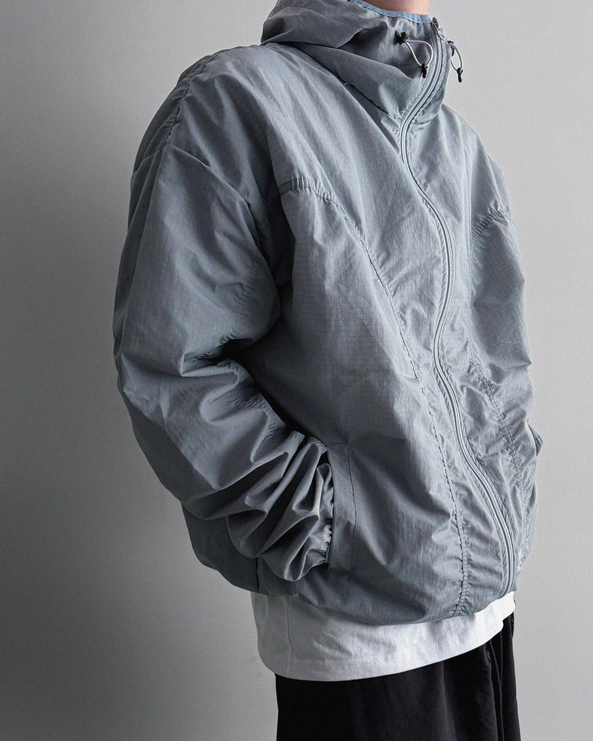 Core shirring waterproof hooded jacket