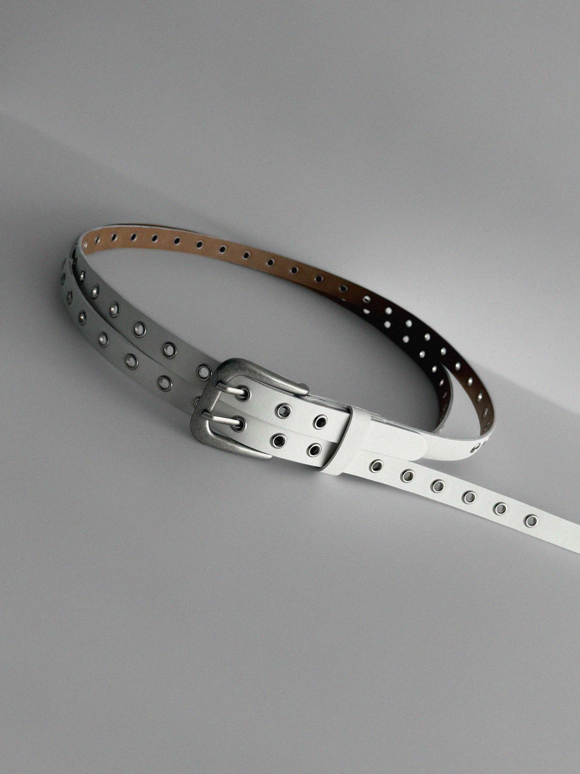 Dual eyelet long belt