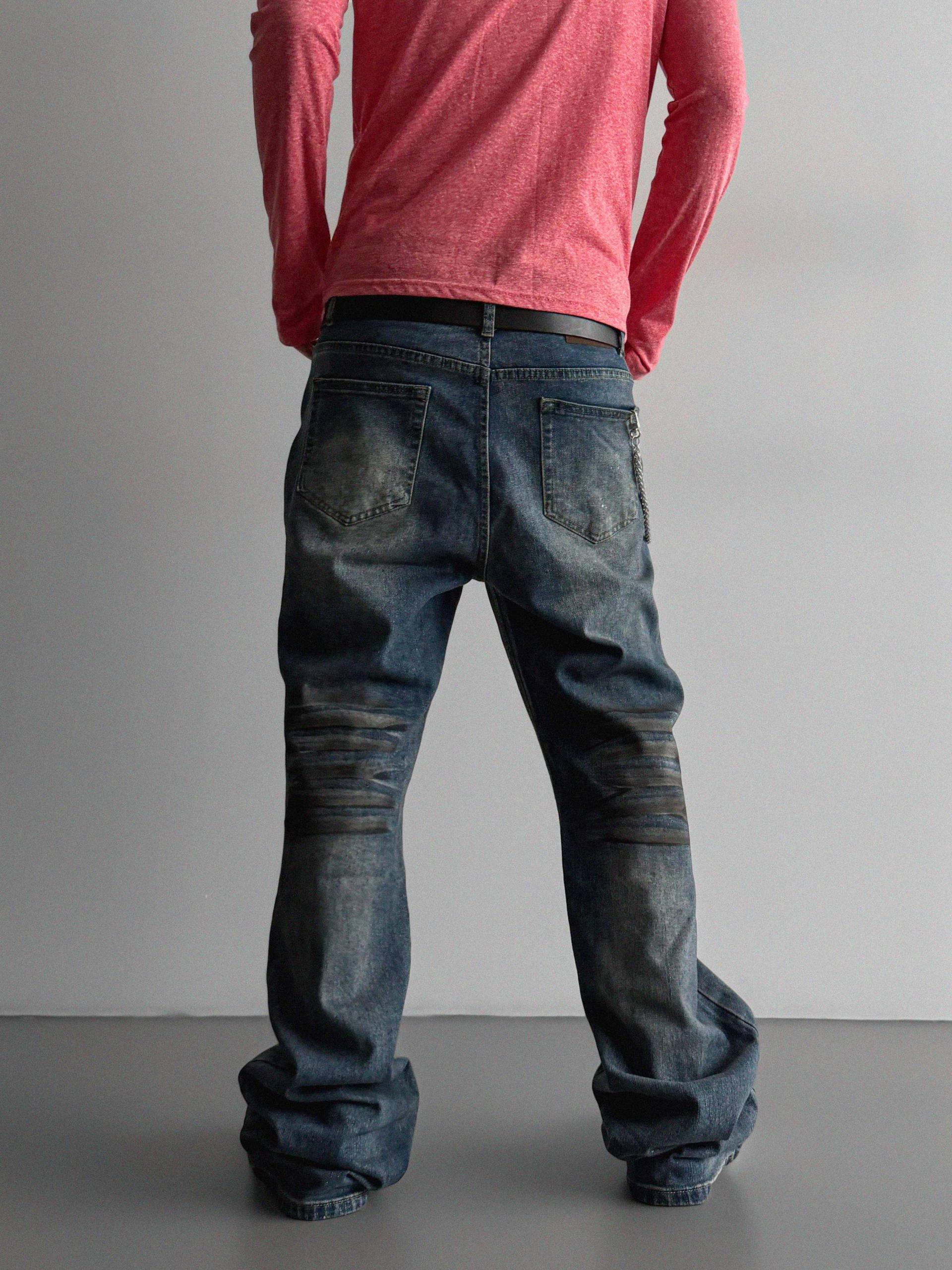 Dirty washed sagging flare jeans