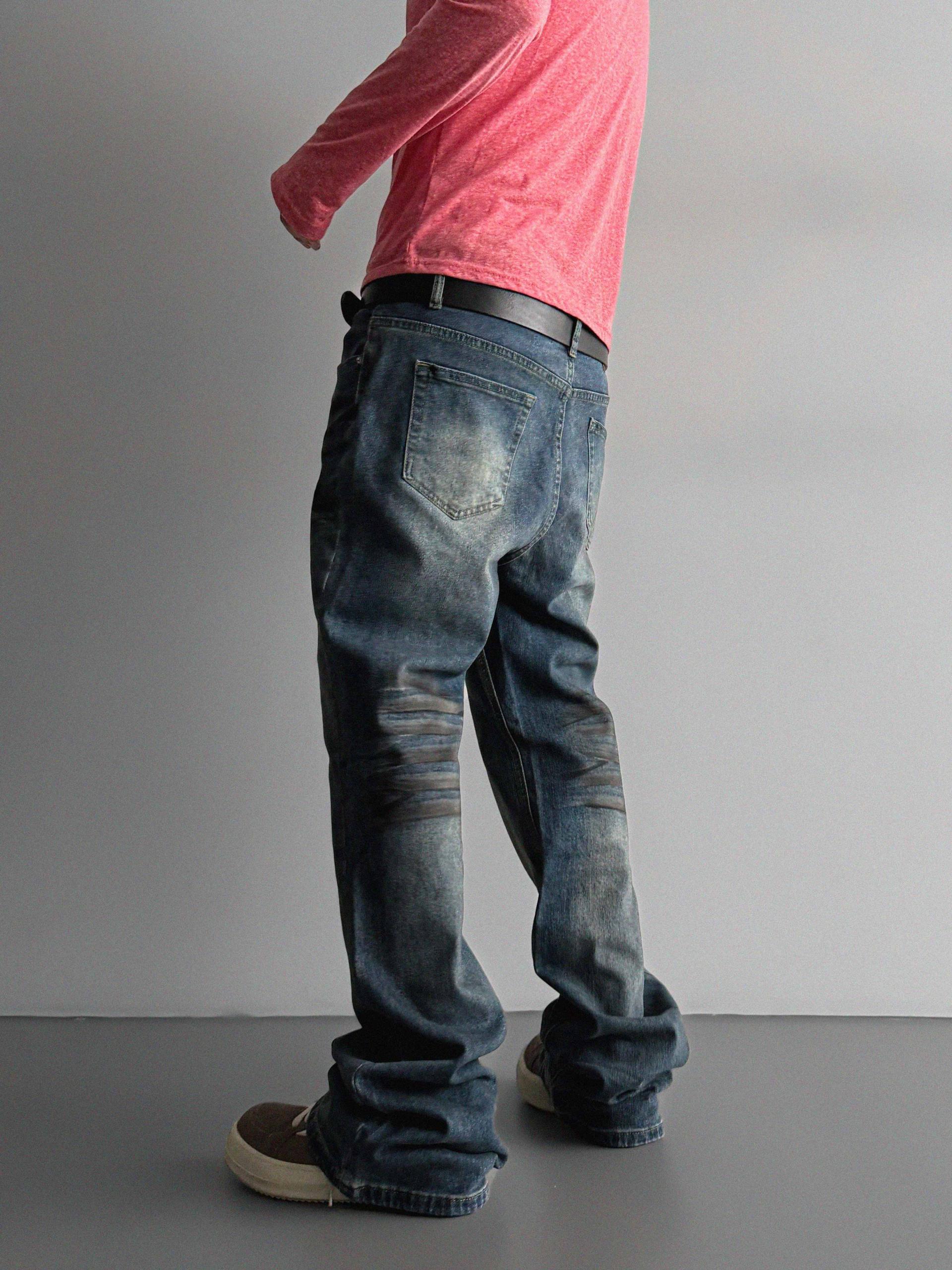 Dirty washed sagging flare jeans