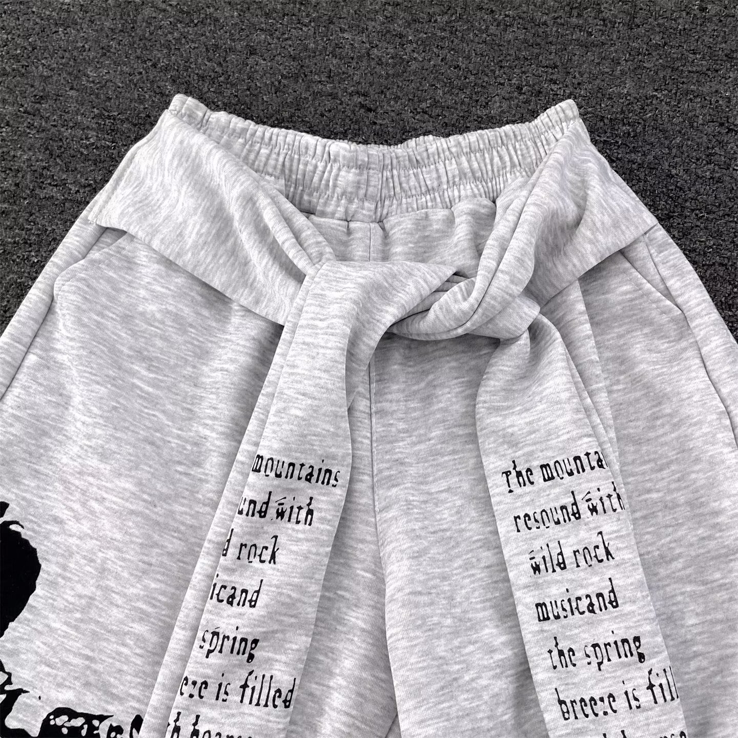 Lettering graphic strap sweat pants