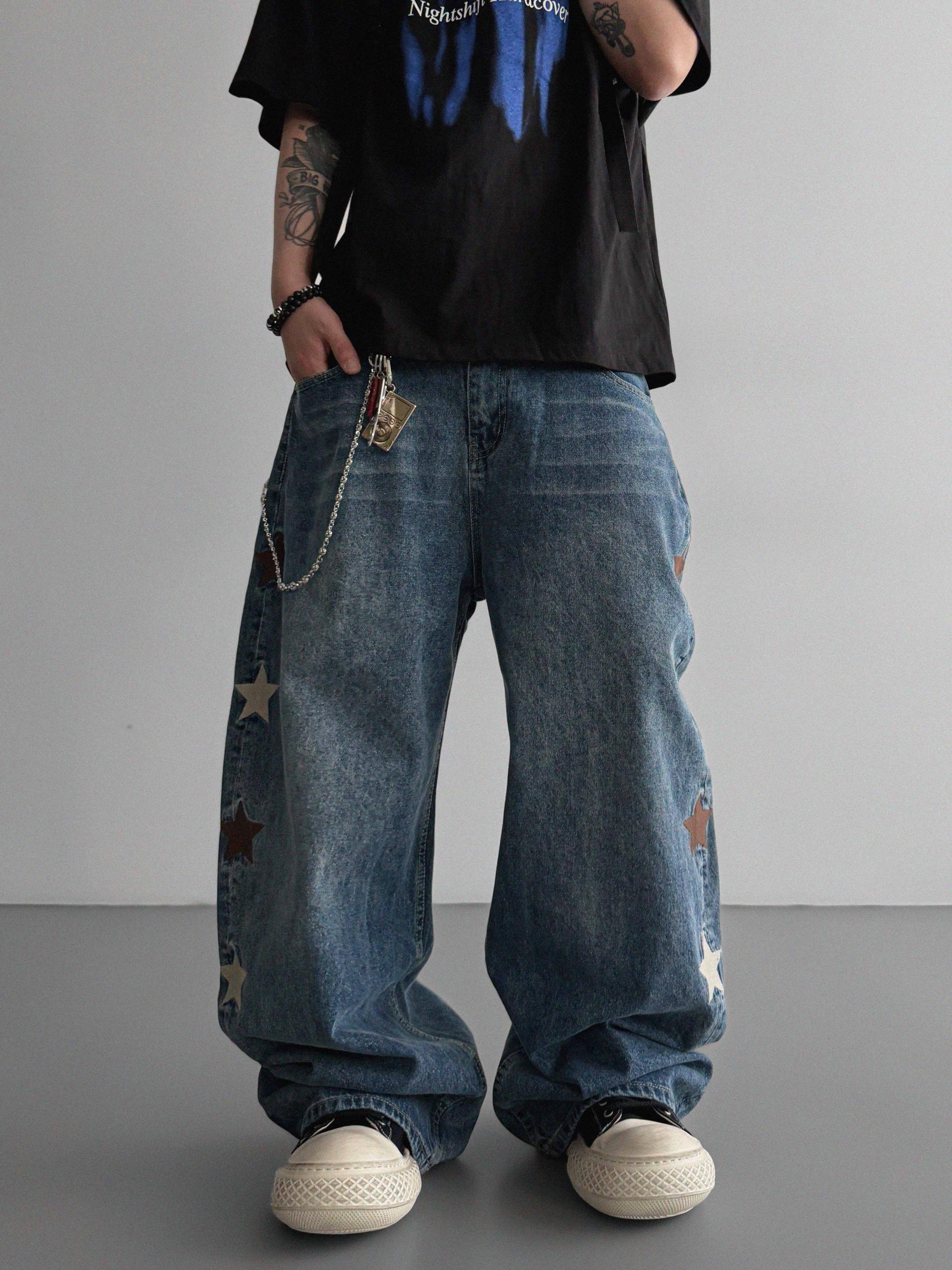 Star embroidered curved denim pants
