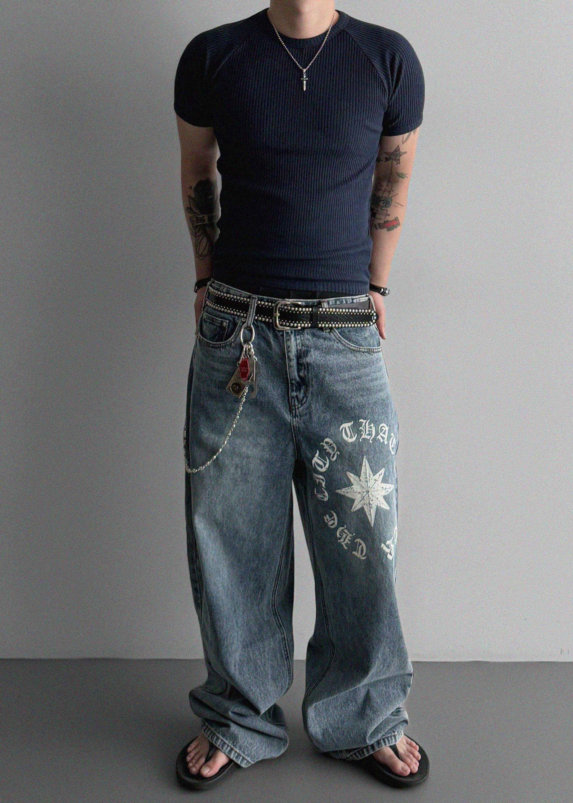 Star lettering curved denim pants