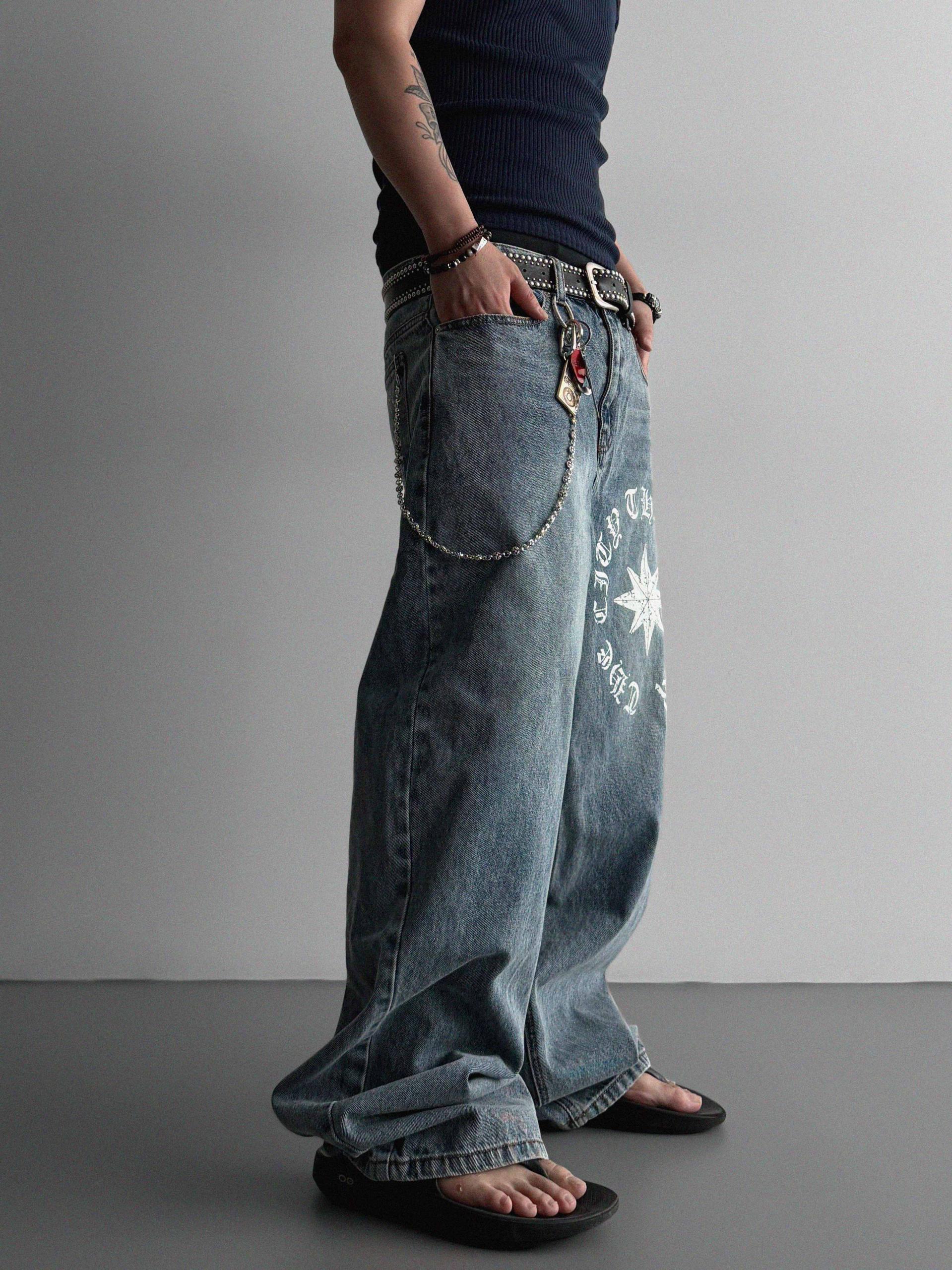 Star lettering curved denim pants