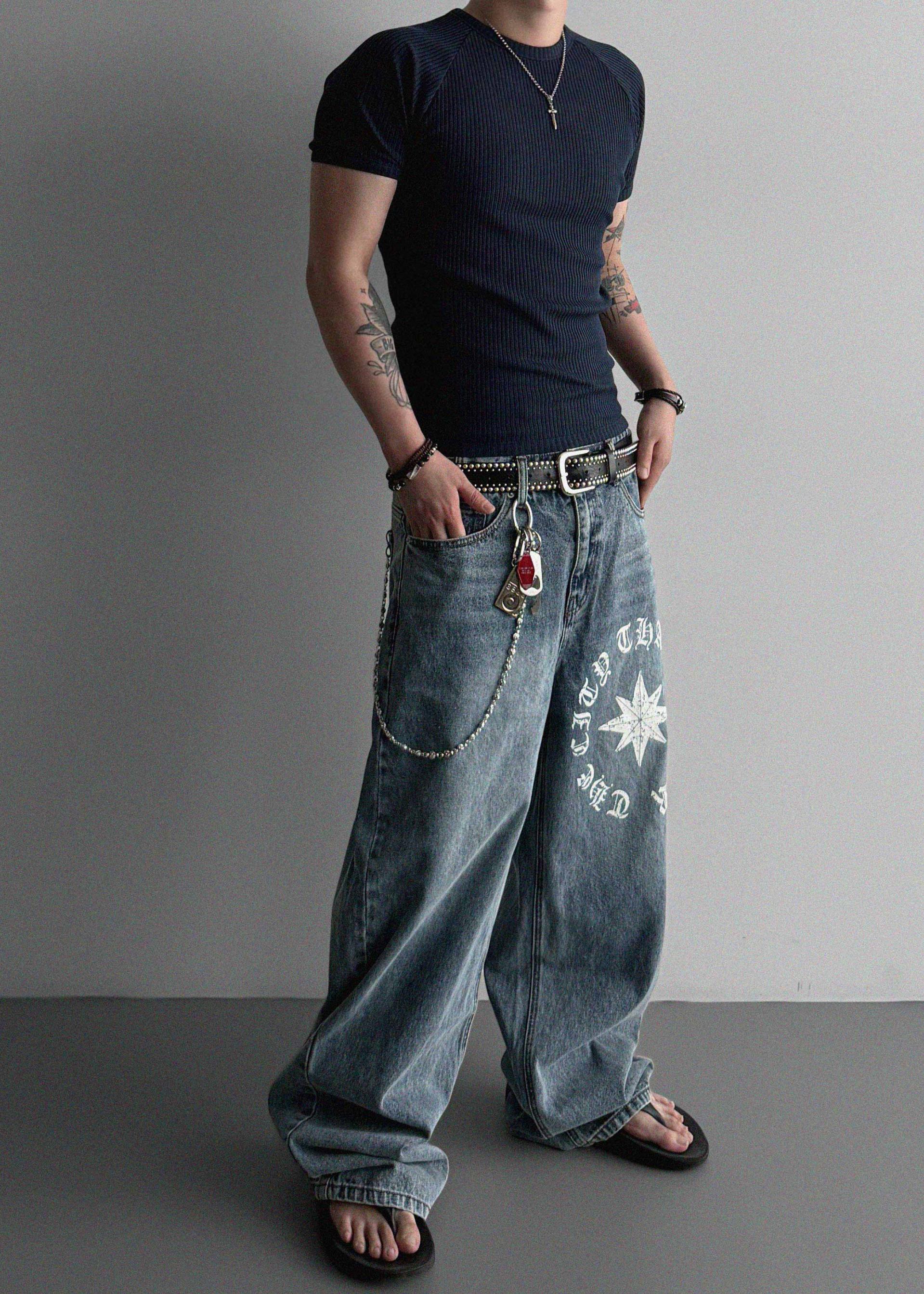 Star lettering curved denim pants