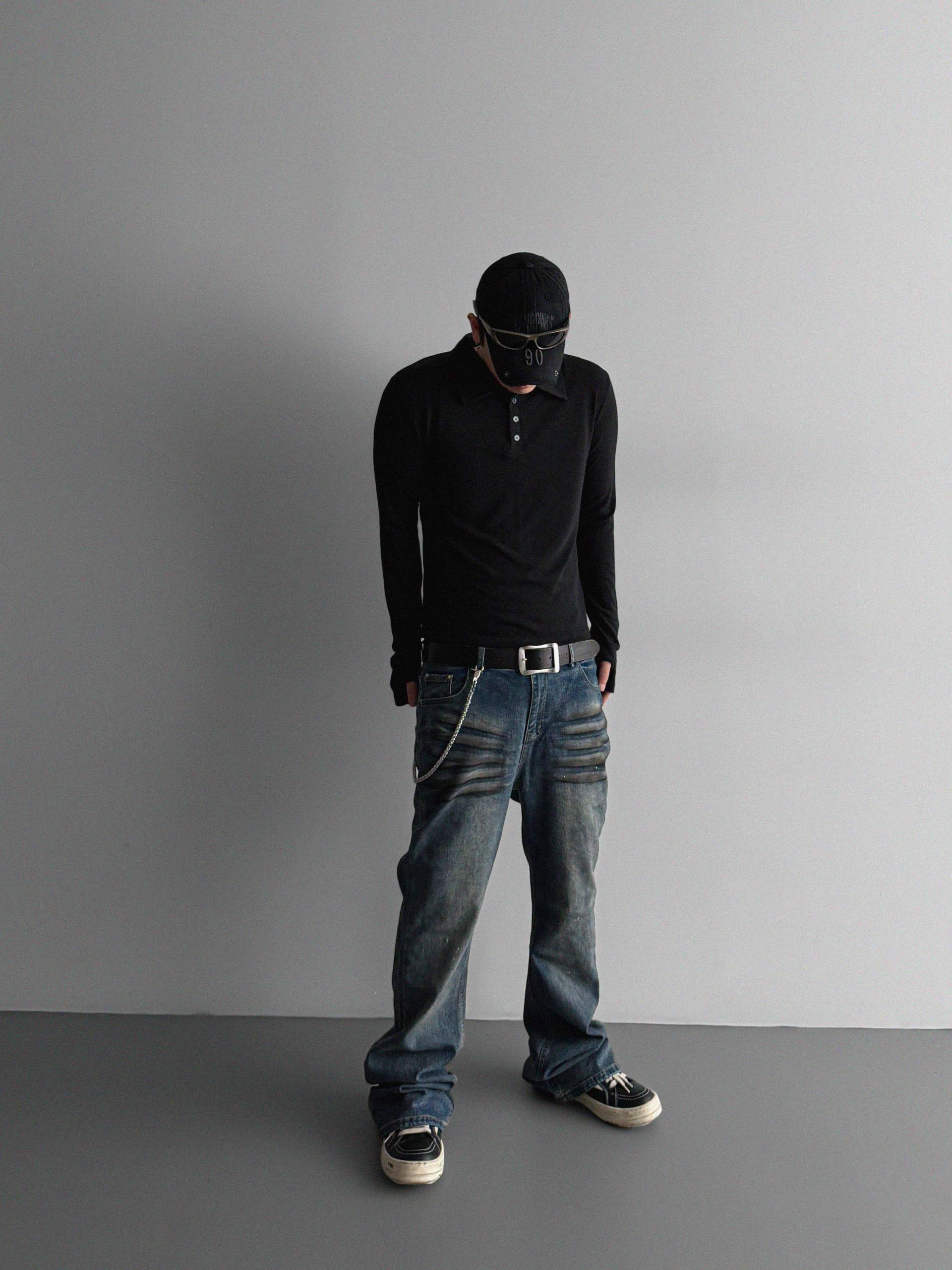 Dirty washed sagging flare jeans