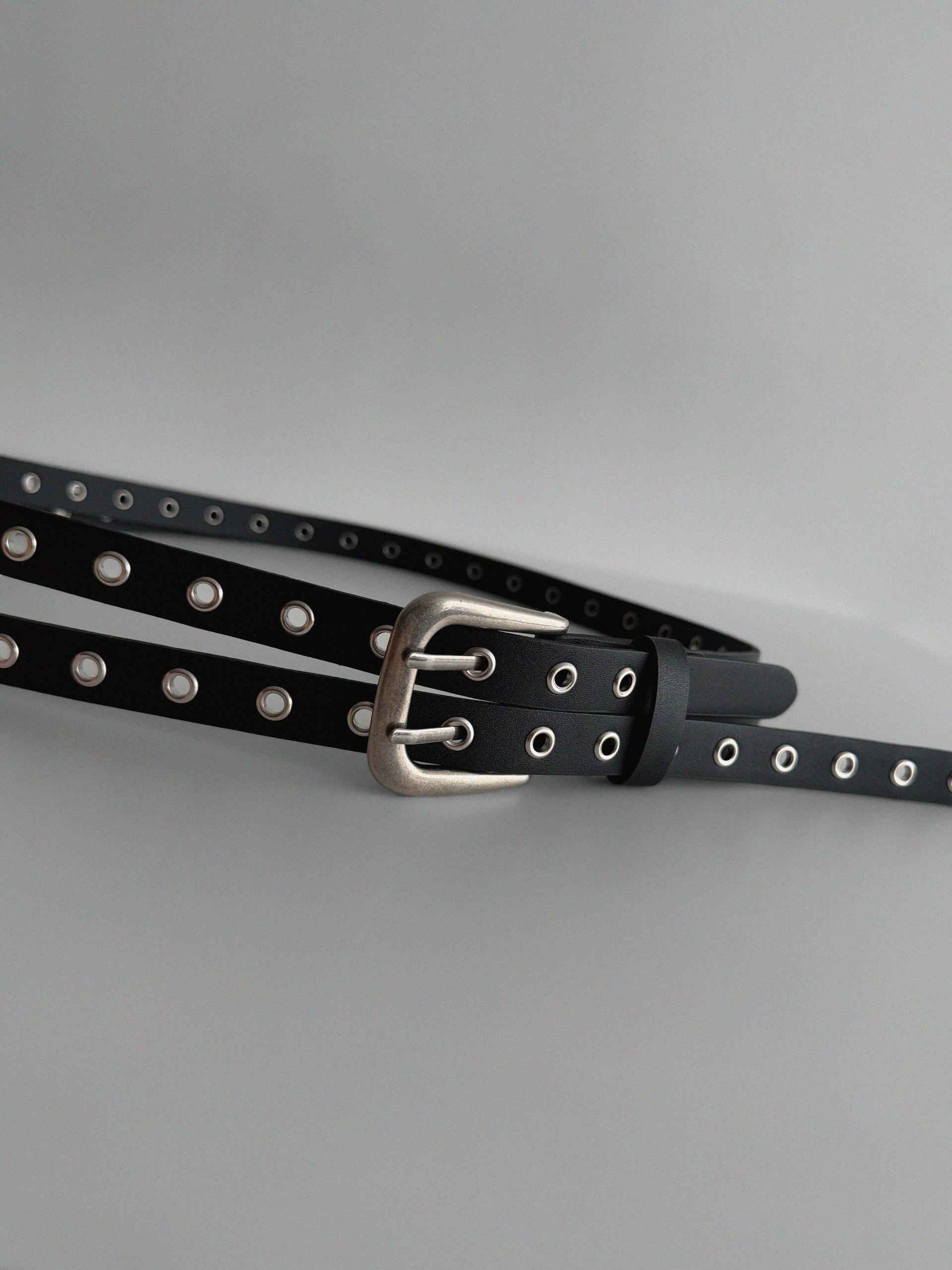 Dual eyelet long belt