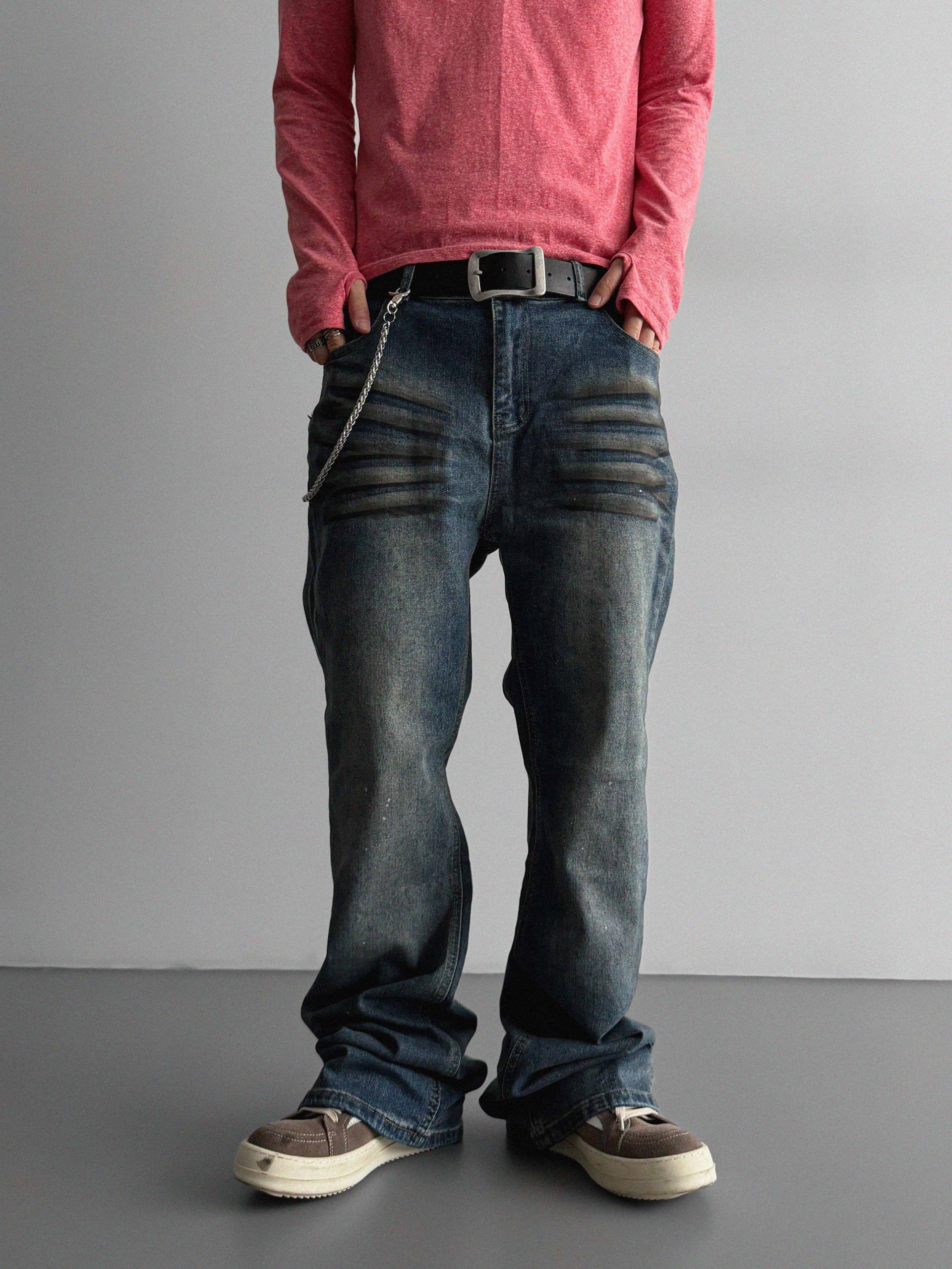 Dirty washed sagging flare jeans