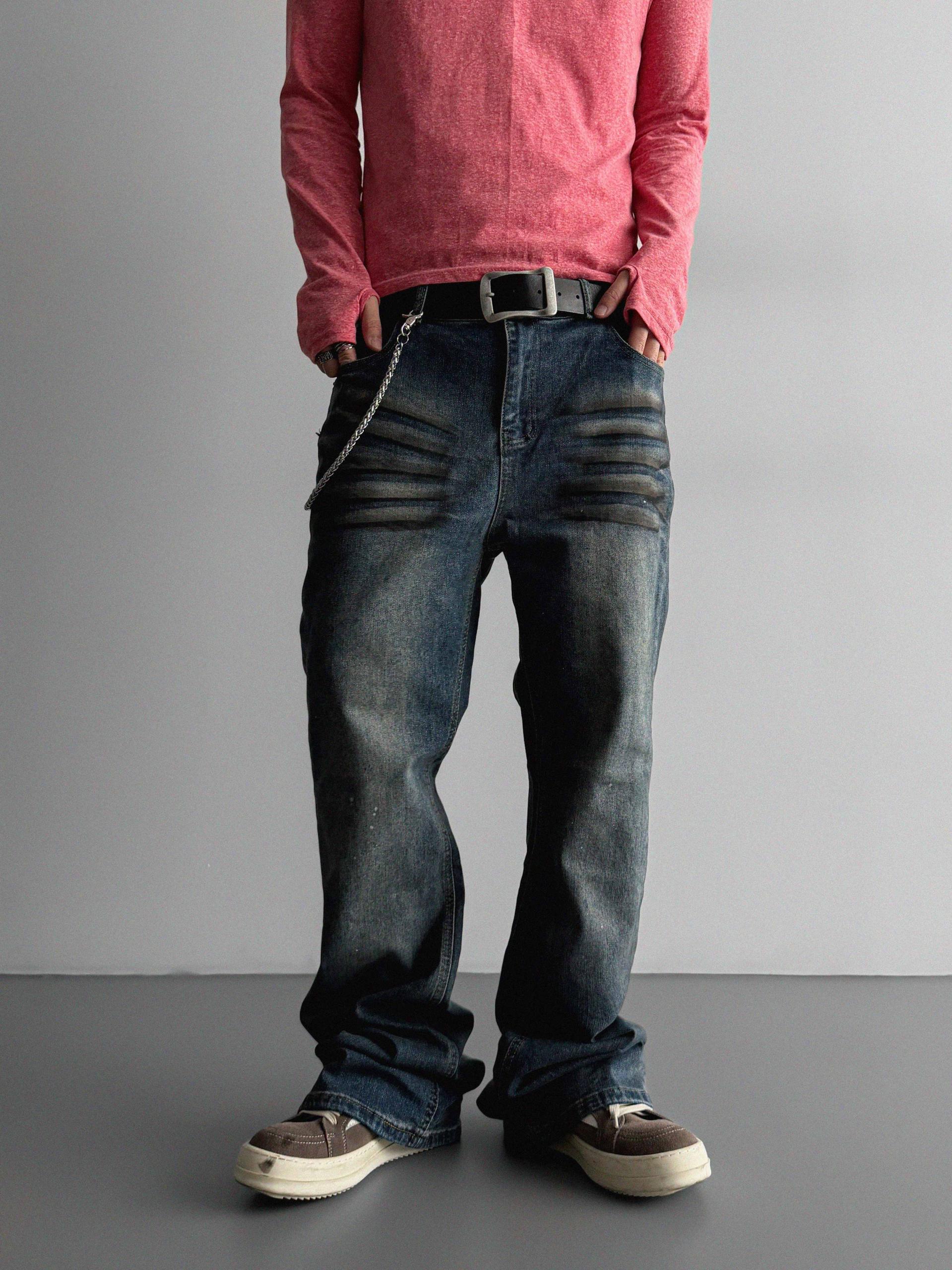 Dirty washed sagging flare jeans