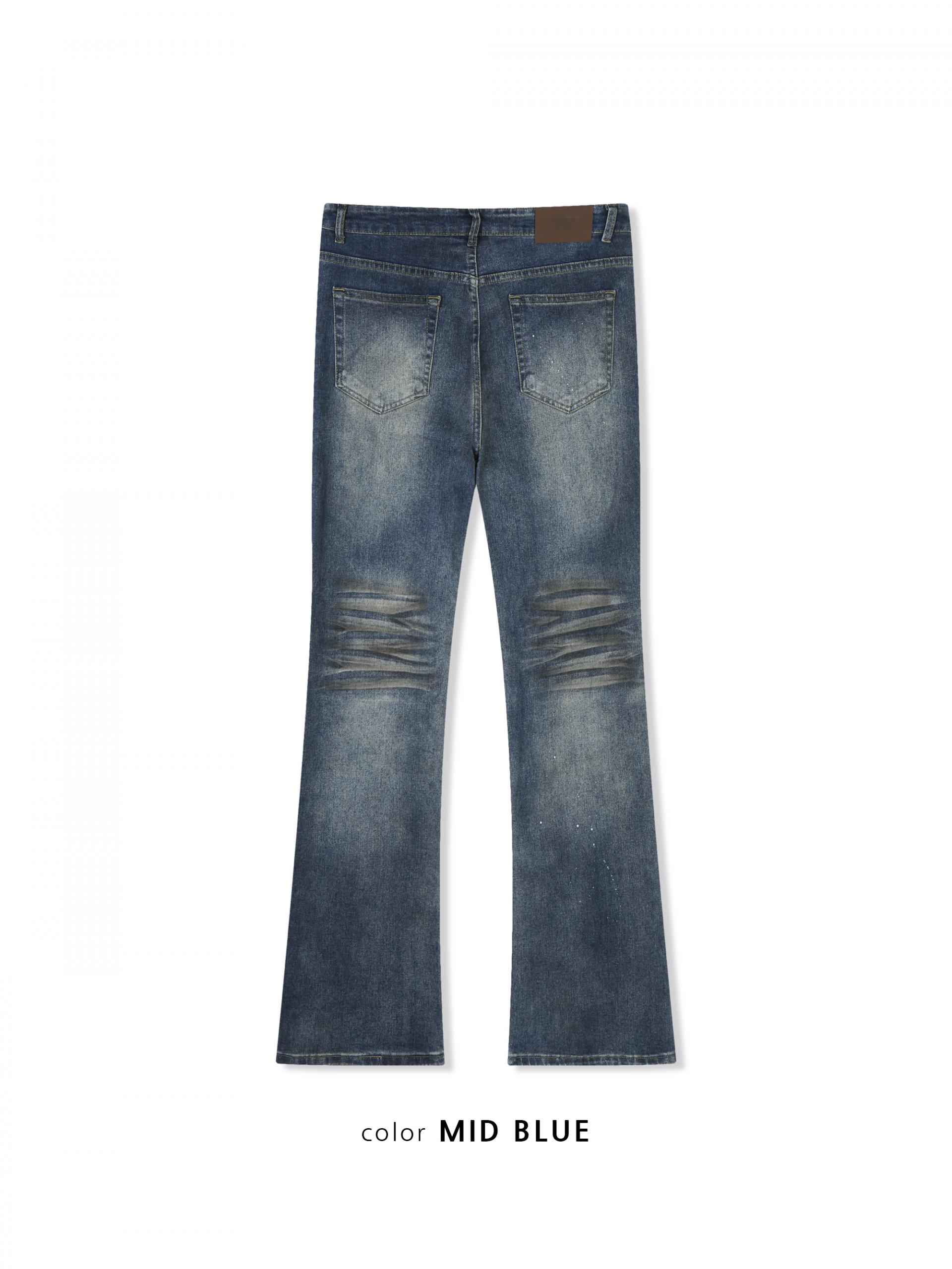 Dirty washed sagging flare jeans