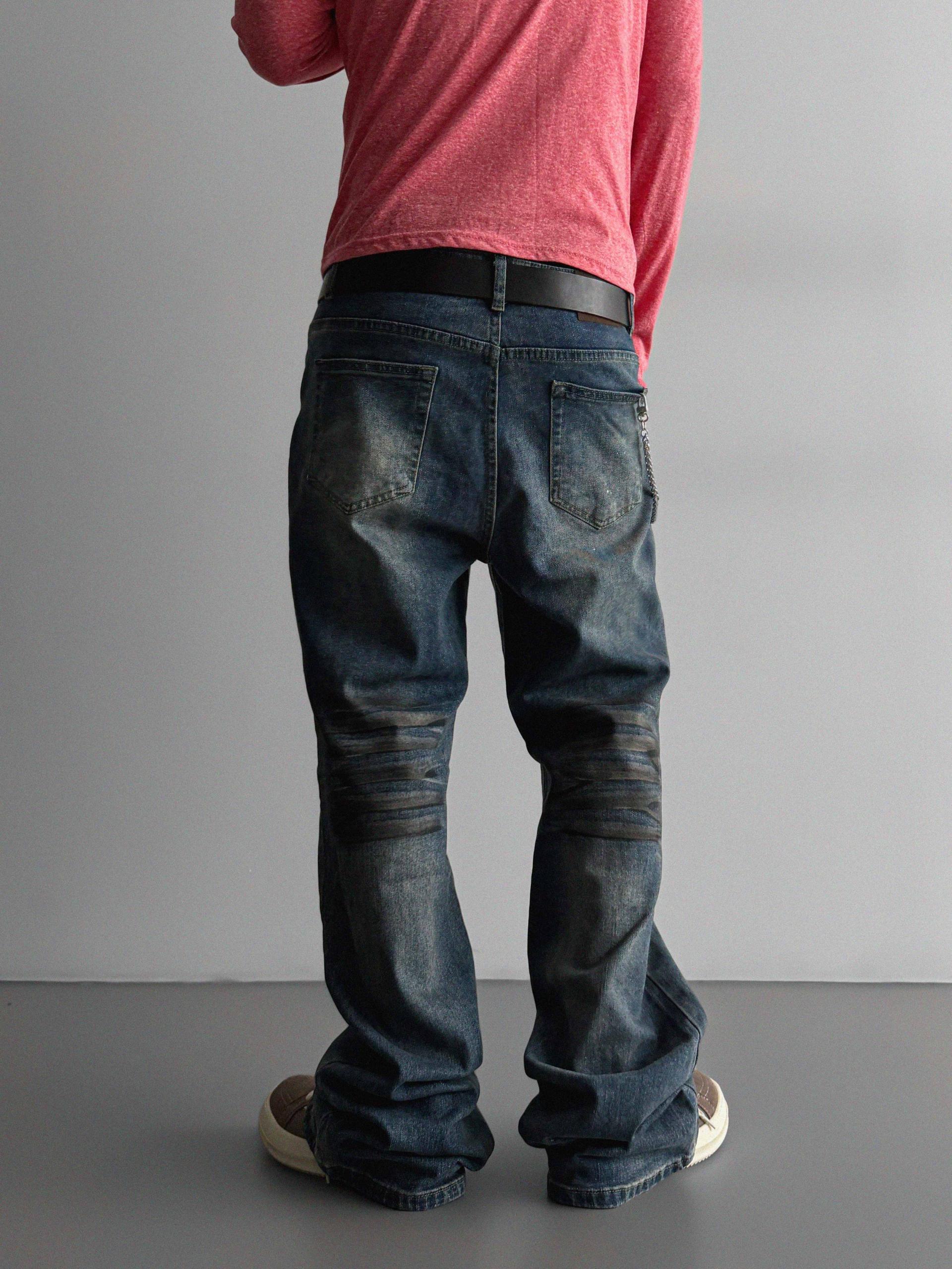 Dirty washed sagging flare jeans