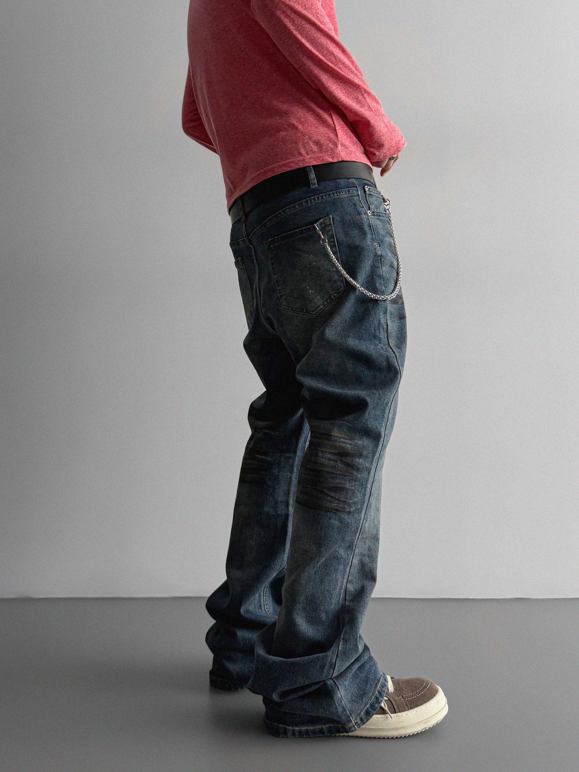 Dirty washed sagging flare jeans