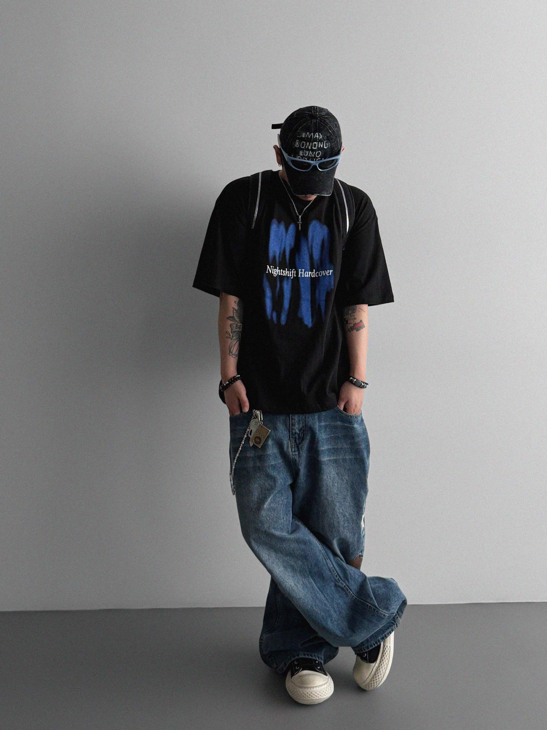 Star embroidered curved denim pants