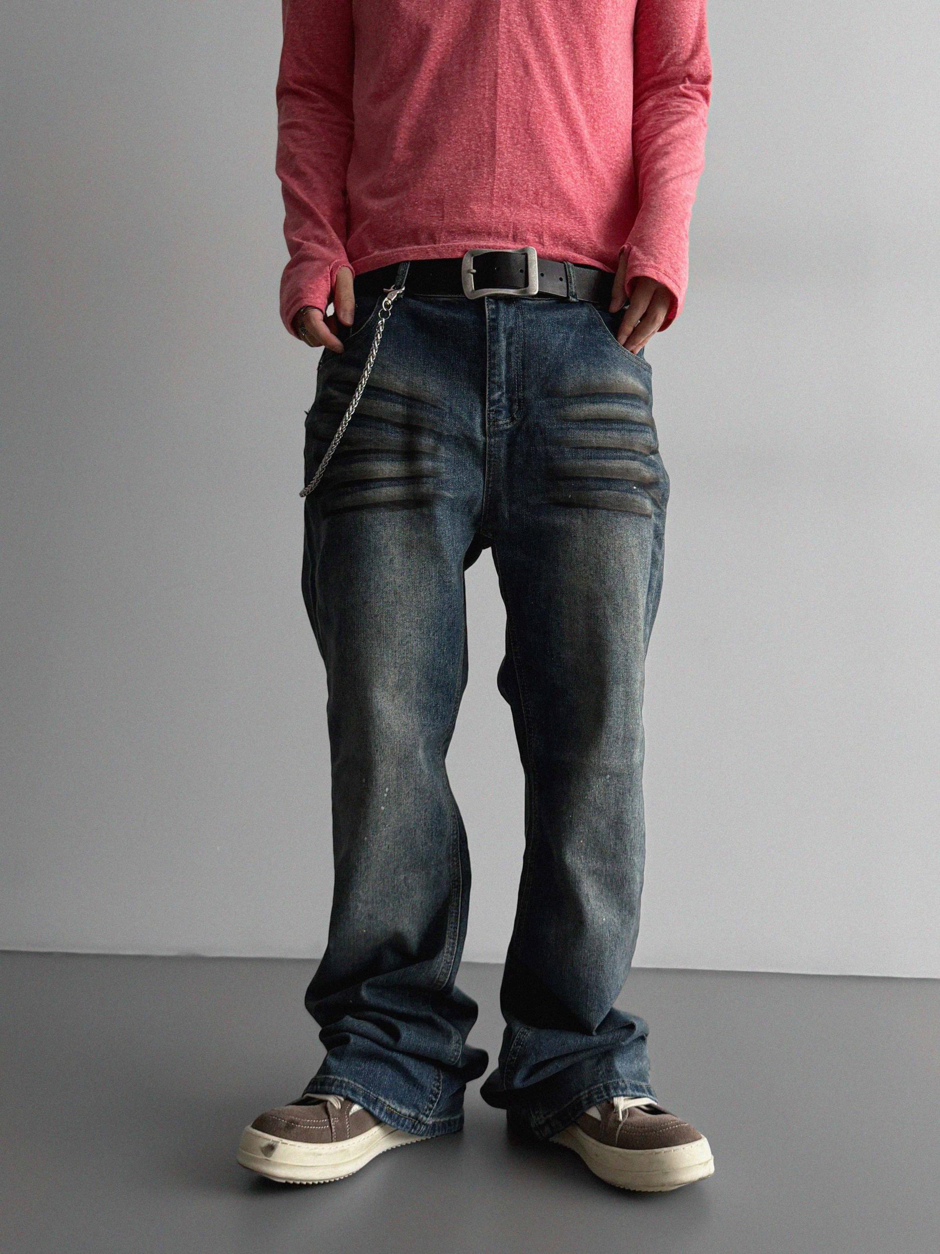 Dirty washed sagging flare jeans
