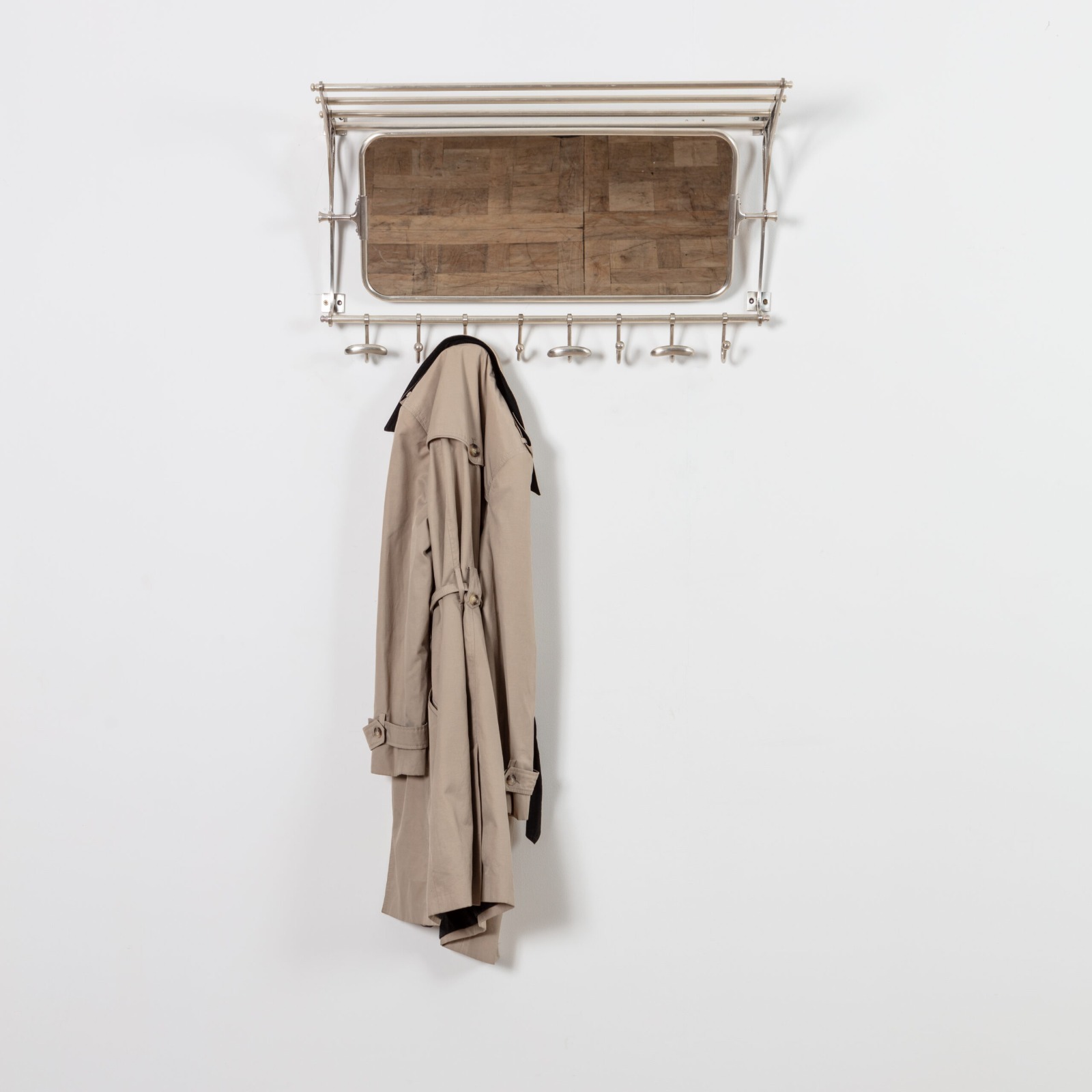 Train wall rack with mirror