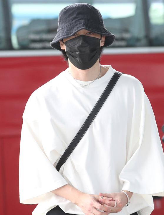 All of BTS Wore Face Masks to the Airport This Morning Except for