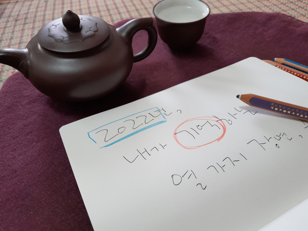 사진1. 손글씨로 내가 기억하는 열 가지 장면이라고 쓴 것을 찍었다.