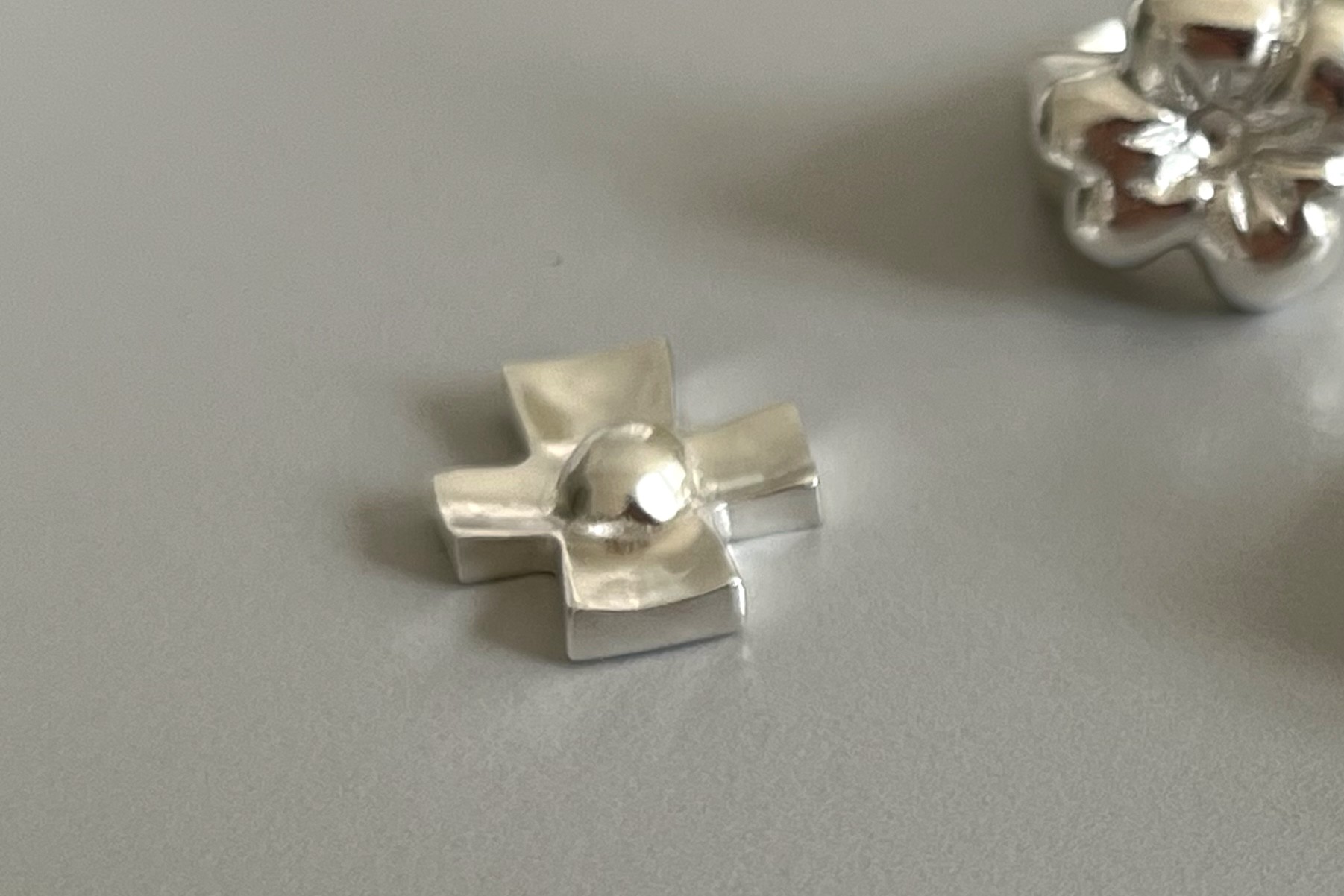 orb cross earrings