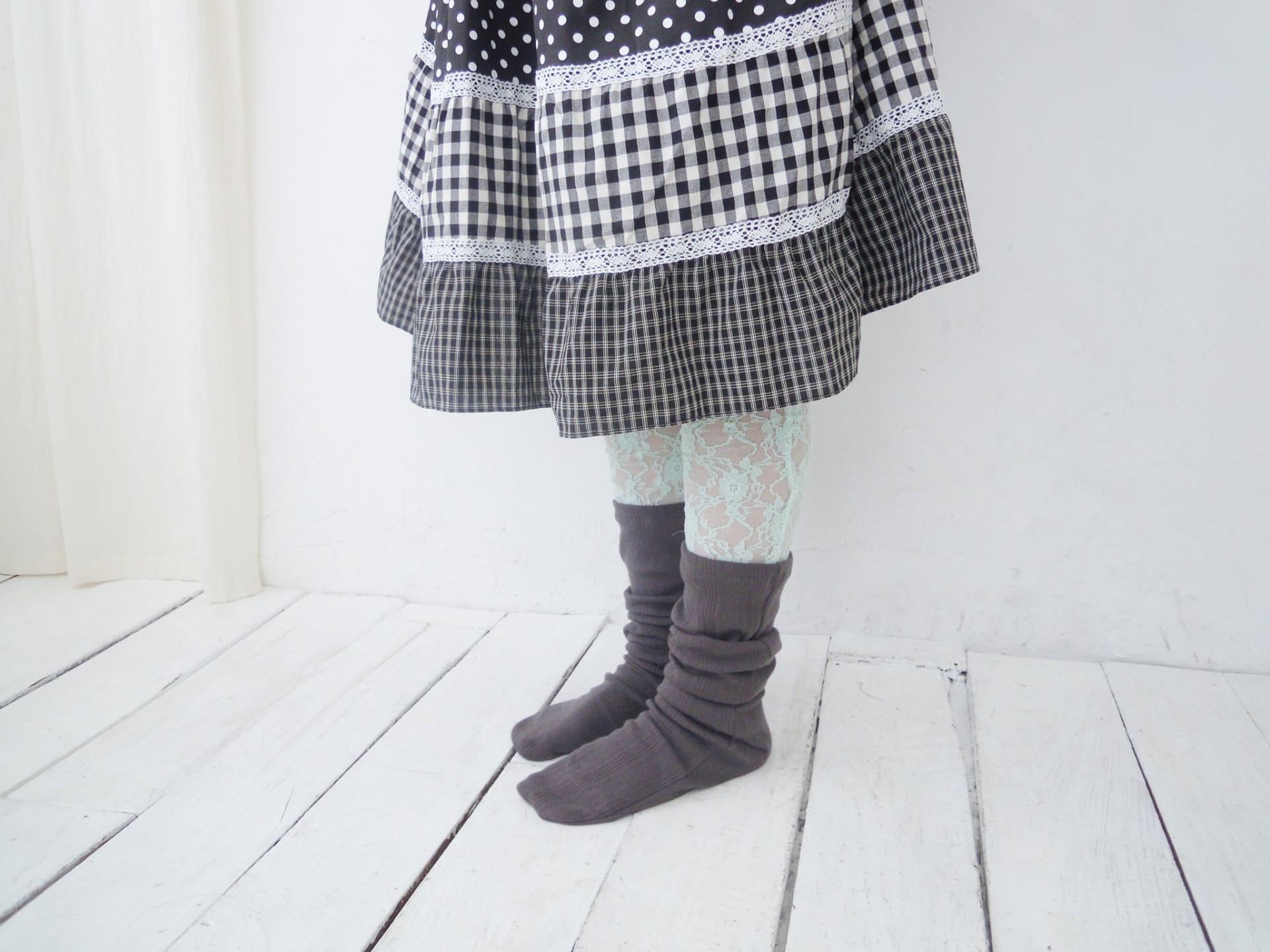 Lace layered over kneesocks / graymint