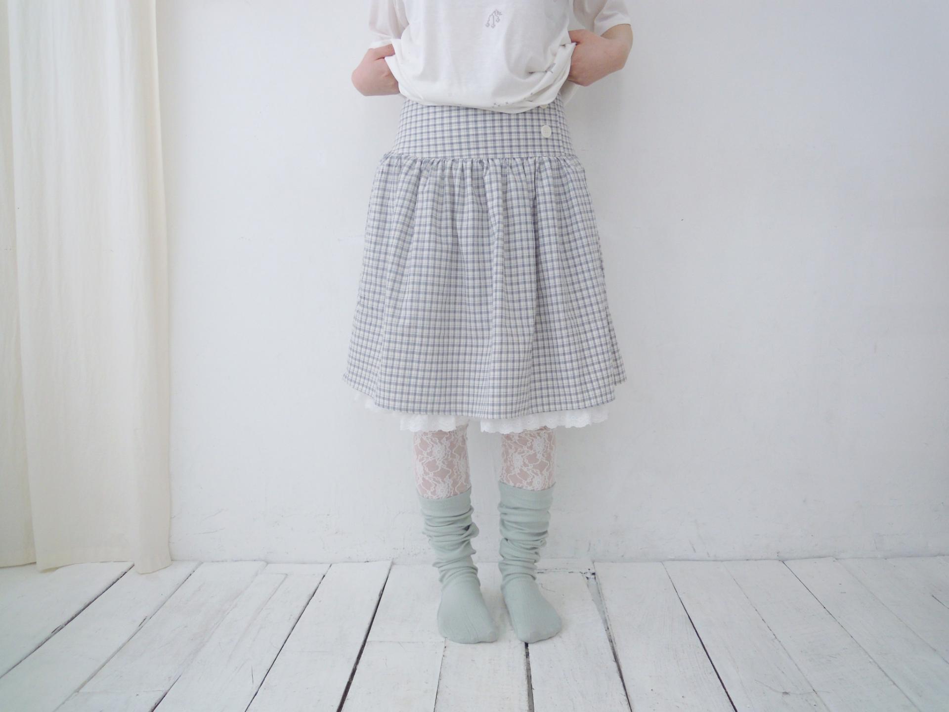 Lace layered over kneesocks / mint