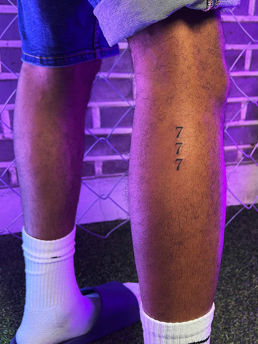 Fine line angel number tattoo in Korea