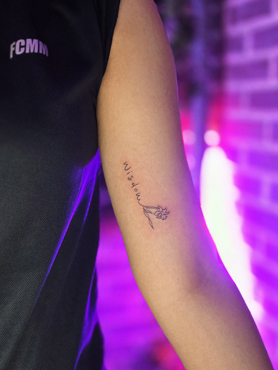 Fine line lettering tattoo in Korea