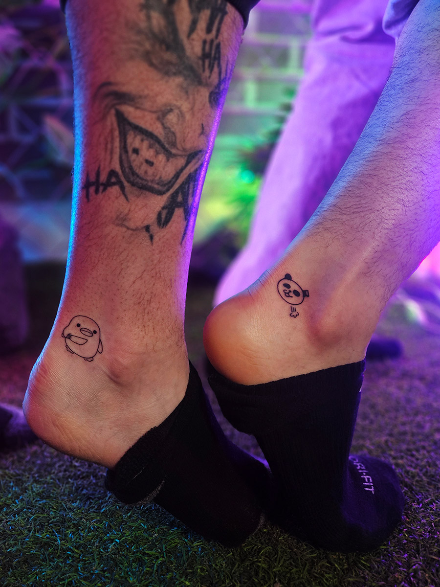 Friends smiling after getting tattoos together in Seoul