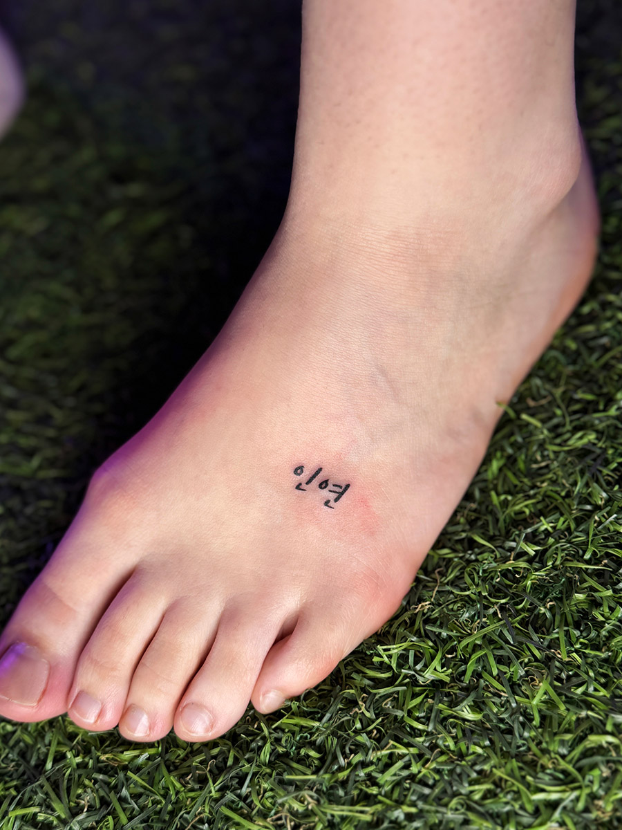 Hangul tattoo in progress at YM Tattoo Hongdae